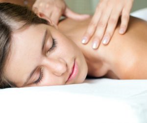 Young woman getting a massage in a spa